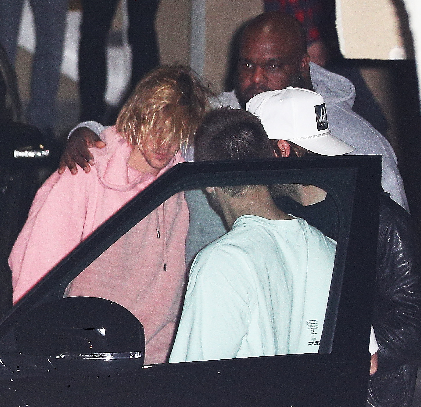Justin Bieber gets comforted by church friends after Selena gomez news in Los Angeles, CA